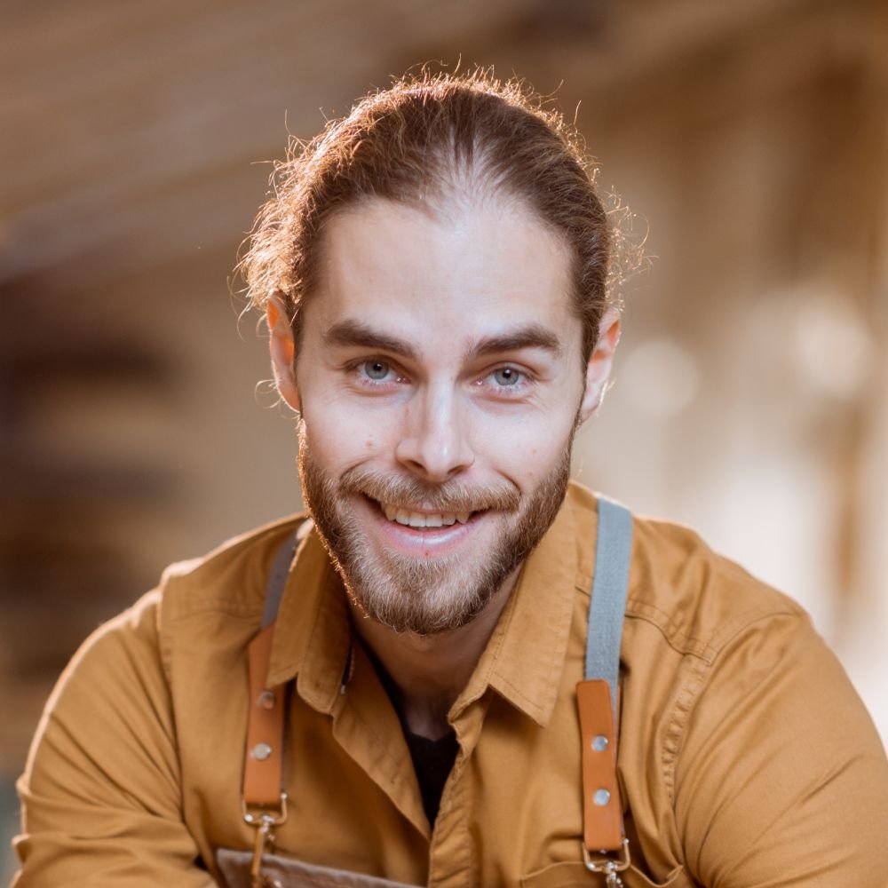 carpenter working with a wood in the workshop 3722b3g 1.jpg
