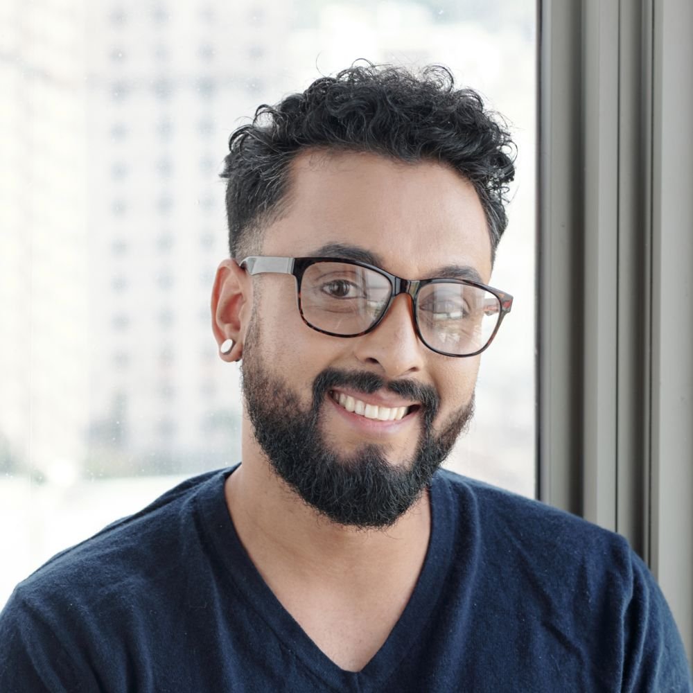 handsome smiling man in glasses 5yveydz 1.jpg