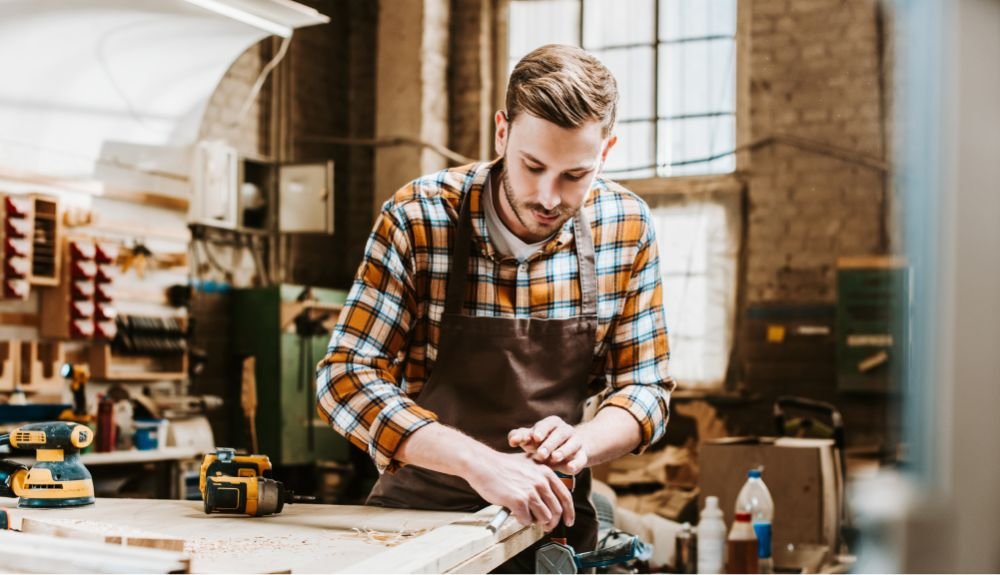 selective focus of bearded woodworker holding chis q38kgje 1.jpg
