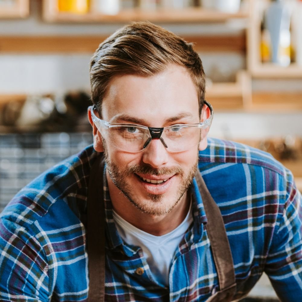 selective focus of happy carpenter in goggles touc 5r7audx 1.jpg